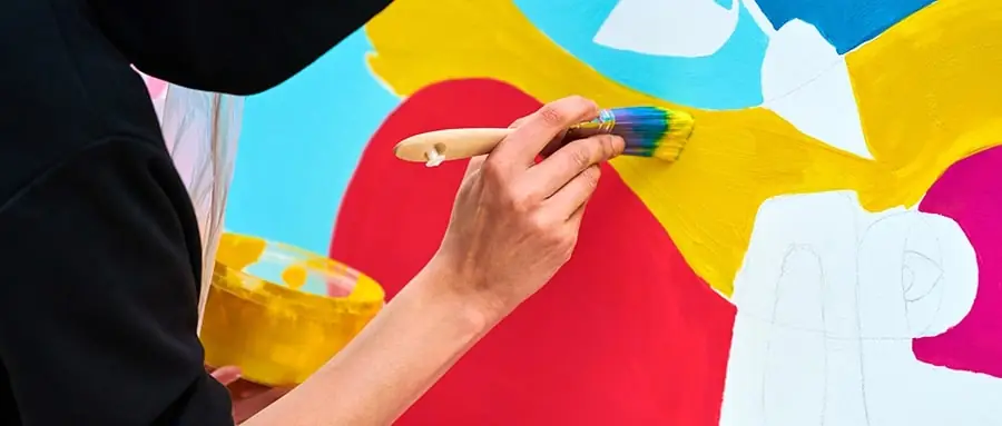 Painting a mural for art class