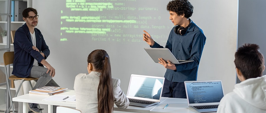 Student presenting in a computer science class