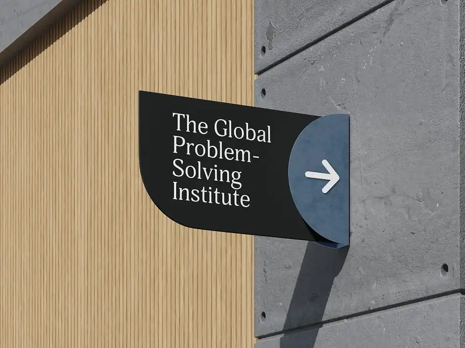 Sign for The Global Problem Solving Institute on a building.