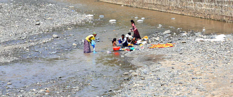 Locals washing clothes in the Beressa River, Debre Birhan, Ethiopia